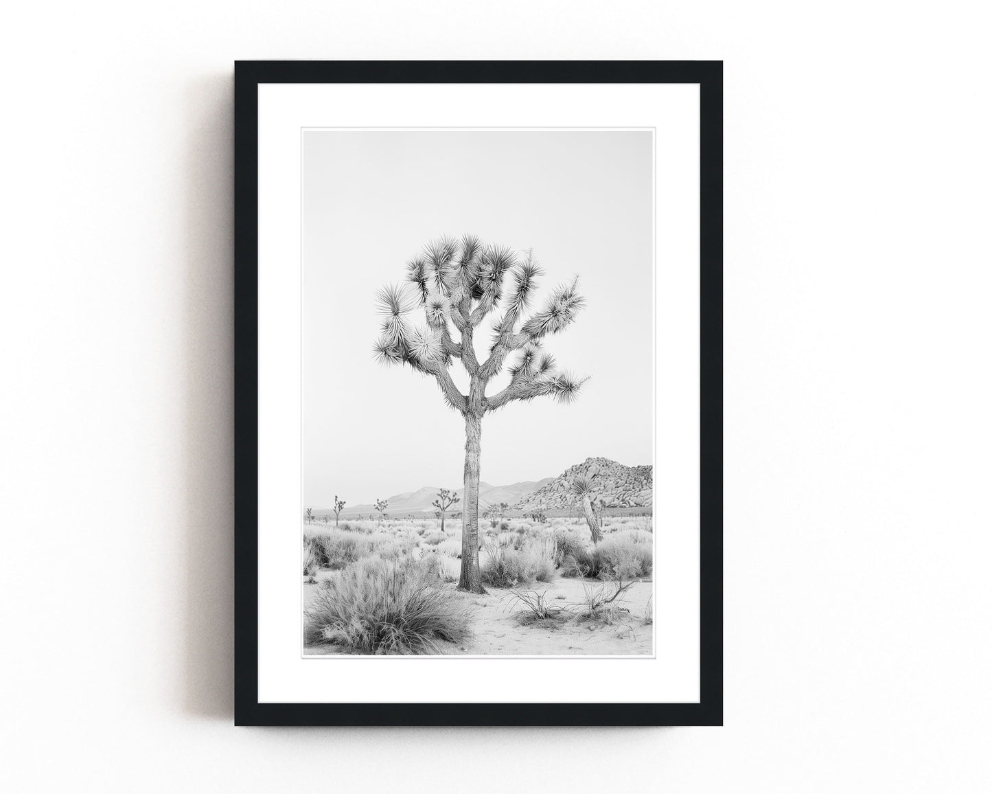 Black and white Joshua Tree art print featuring a desert landscape, perfect for contemporary and southwestern decor.