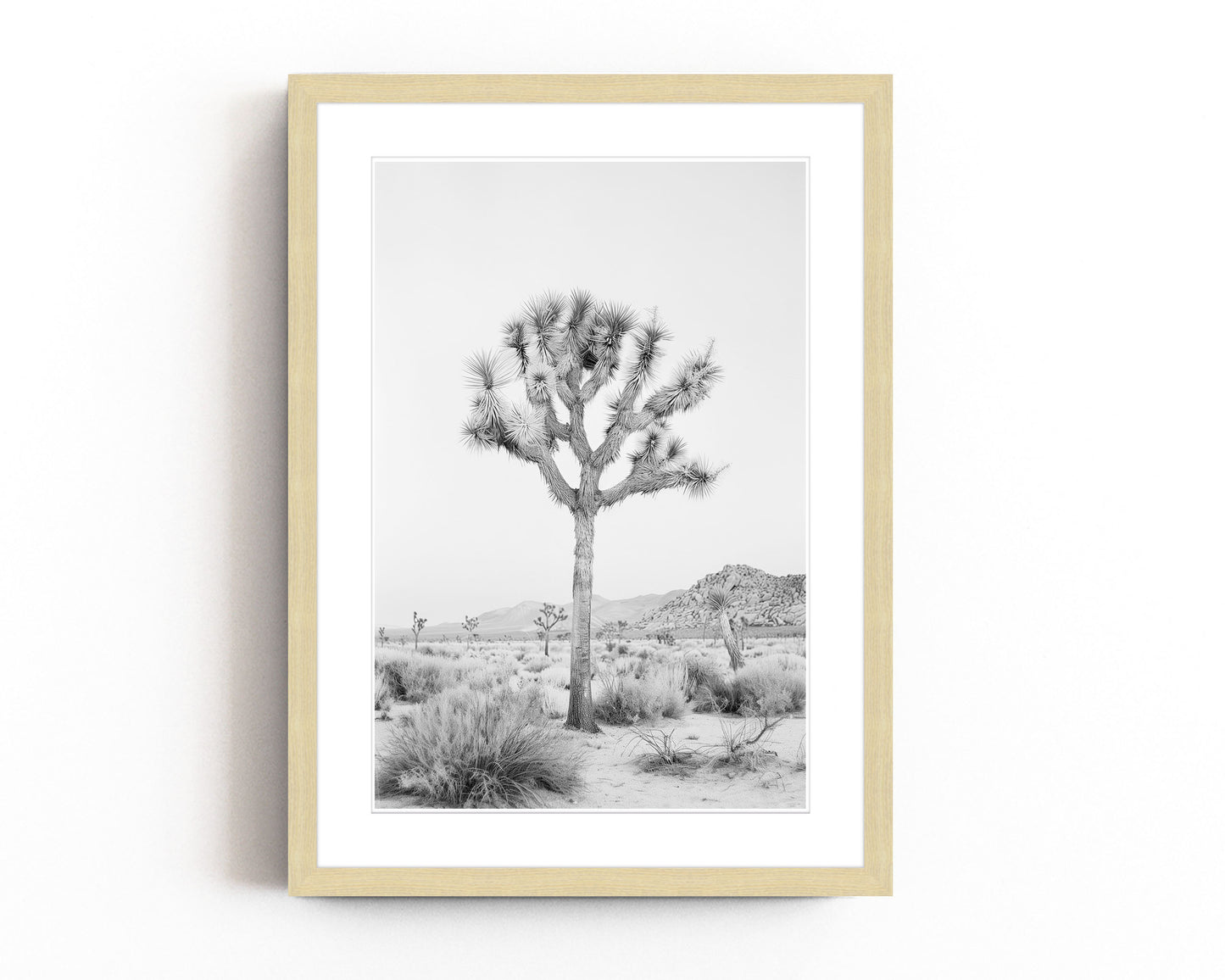 Black and white Joshua Tree art print featuring a desert landscape, perfect for contemporary and southwestern decor.