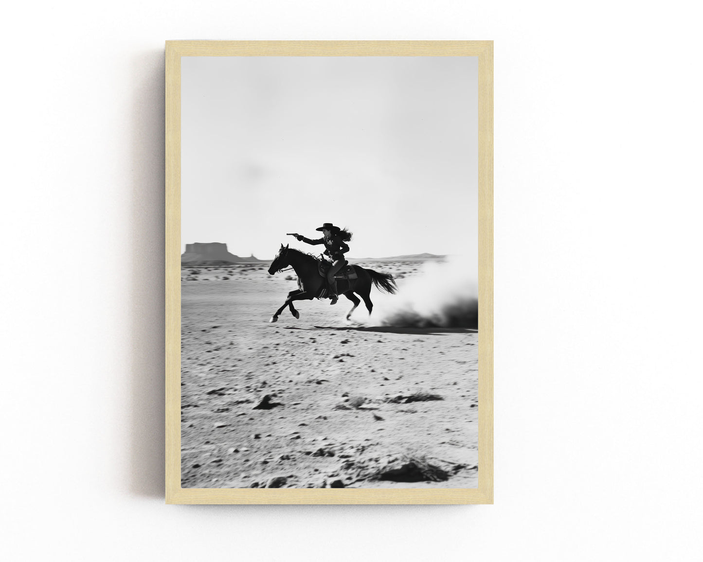 Black-and-white art print of a galloping cowboy in the desert, perfect for rustic western or minimalist home decor.
