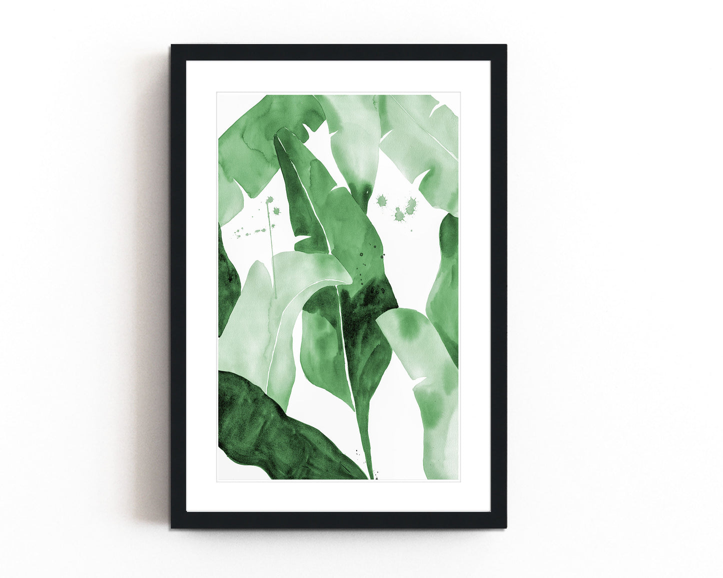 Watercolor painting of lush green tropical banana leaves with overlapping layers in various shades of green. Modern minimalist botanical artwork with subtle paint splatters, ideal for nature-inspired home decor