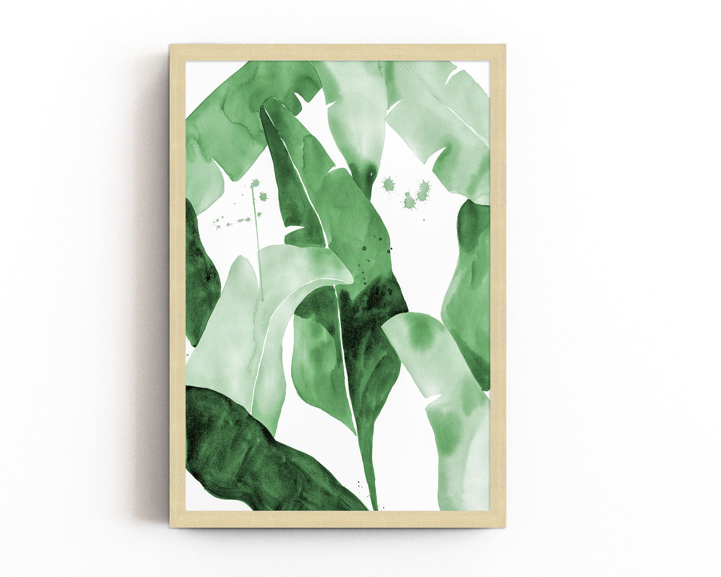 Watercolor painting of lush green tropical banana leaves with overlapping layers in various shades of green. Modern minimalist botanical artwork with subtle paint splatters, ideal for nature-inspired home decor