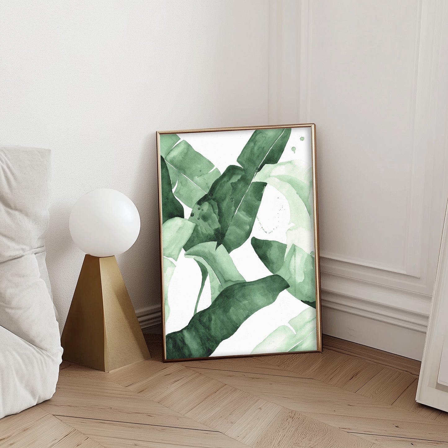 Abstract watercolor artwork featuring banana leaves in various shades of green, creating a tropical and nature-inspired aesthetic.