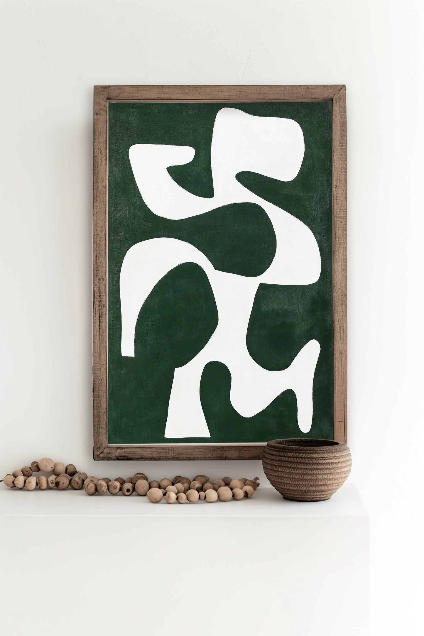 An abstract art print featuring bold white geometric shapes against a deep green background, perfect for modern and minimalist decor.