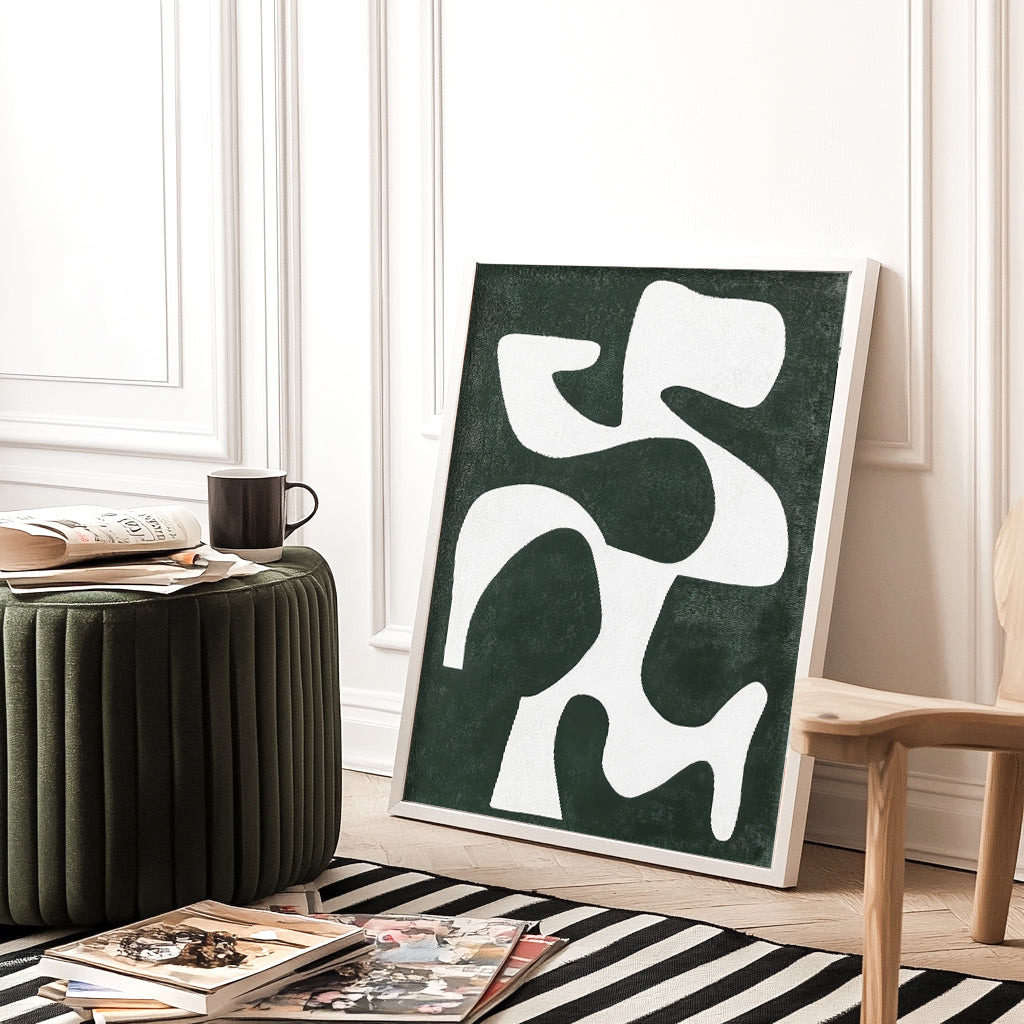 An abstract art print featuring bold white geometric shapes against a deep green background, perfect for modern and minimalist decor.