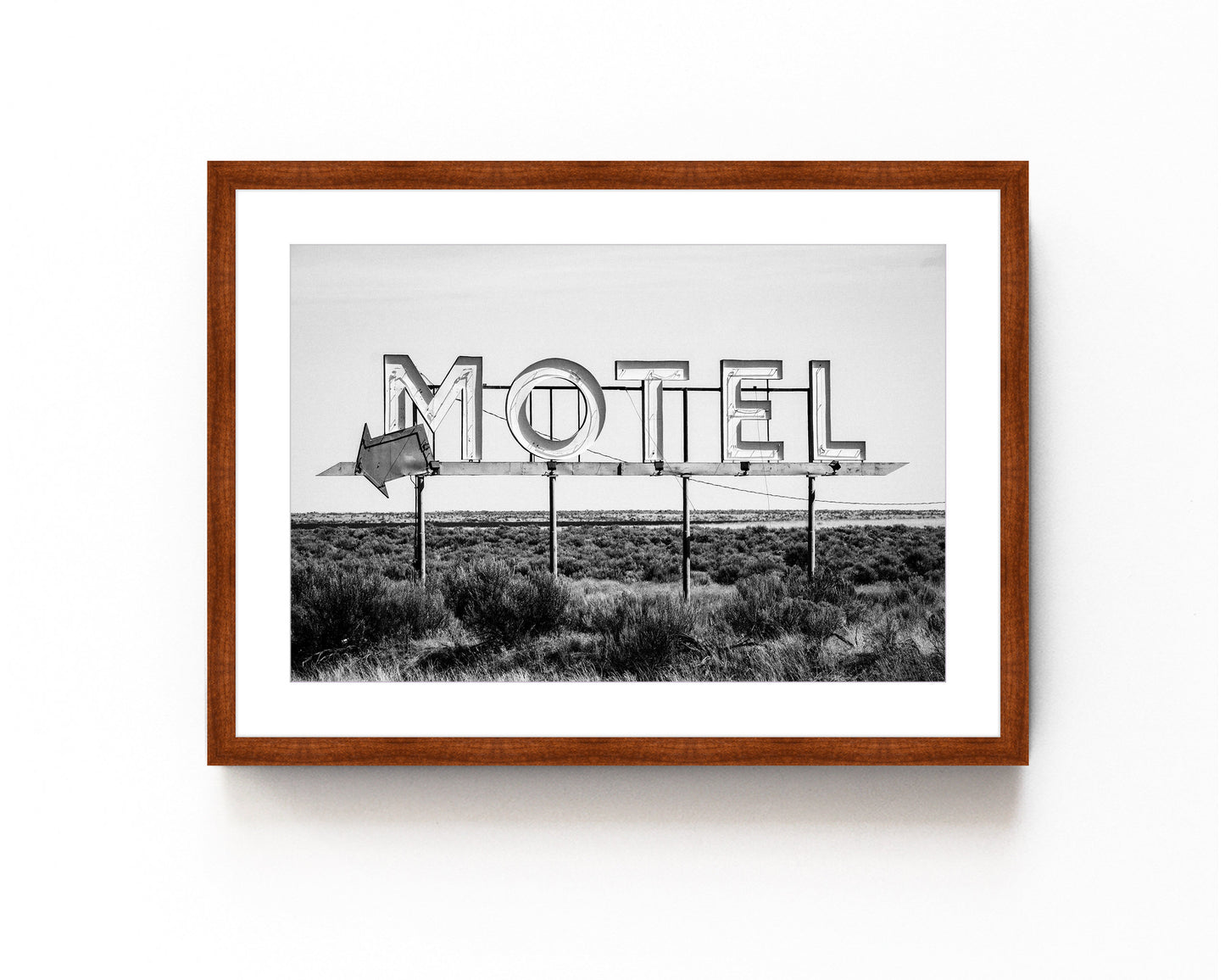 Vintage motel sign art print in black and white featuring a nostalgic roadside sign. Perfect for retro roadside decor, western-inspired art, and vintage wall photography