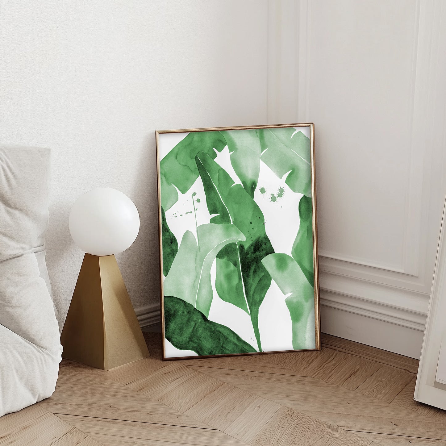 Watercolor painting of lush green tropical banana leaves with overlapping layers in various shades of green. Modern minimalist botanical artwork with subtle paint splatters, ideal for nature-inspired home decor