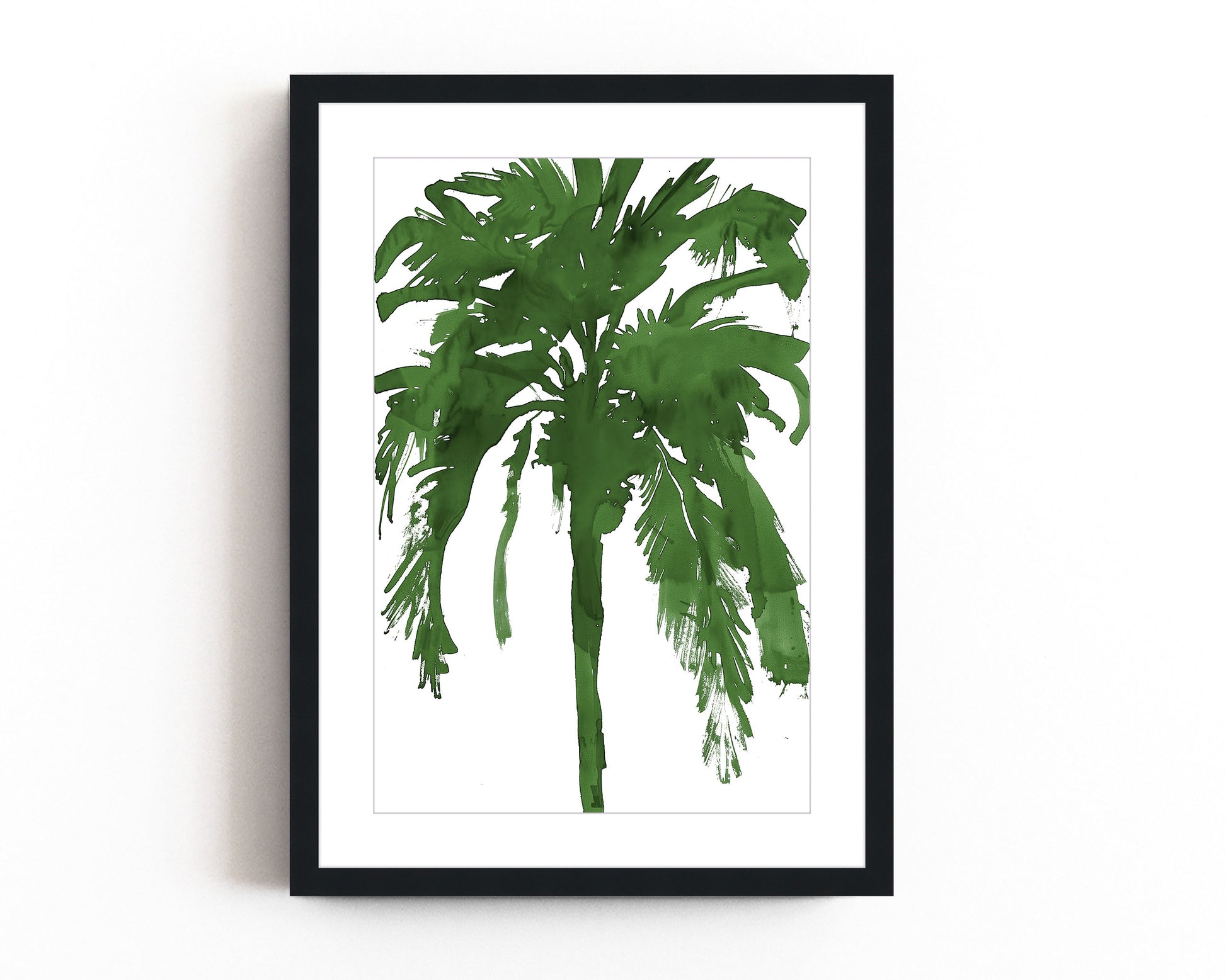 Bold green palm tree silhouette art print in a minimalist style on a white background. Perfect for tropical, coastal, or nature-inspired decor, this abstract botanical print adds a vibrant and modern touch to any space.