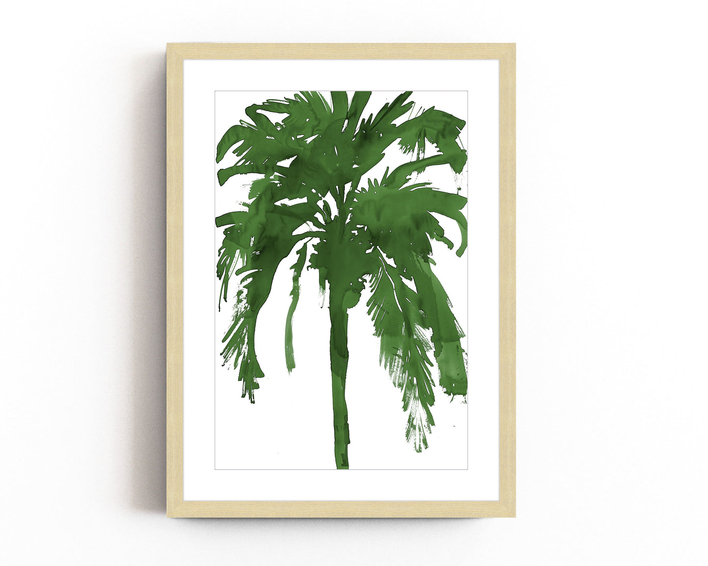 Bold green palm tree silhouette art print in a minimalist style on a white background. Perfect for tropical, coastal, or nature-inspired decor, this abstract botanical print adds a vibrant and modern touch to any space.