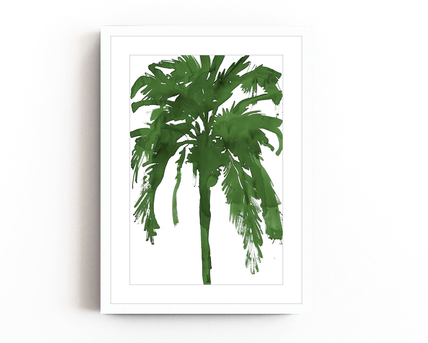 Bold green palm tree silhouette art print in a minimalist style on a white background. Perfect for tropical, coastal, or nature-inspired decor, this abstract botanical print adds a vibrant and modern touch to any space.