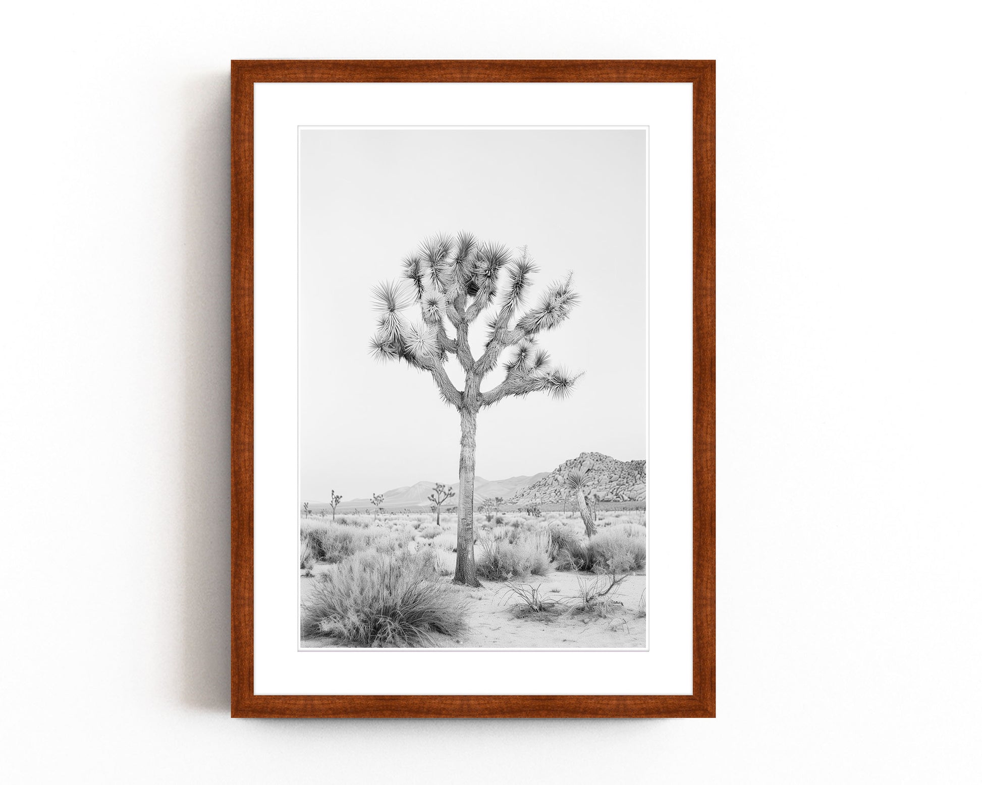 Black and white Joshua Tree art print featuring a desert landscape, perfect for contemporary and southwestern decor.
