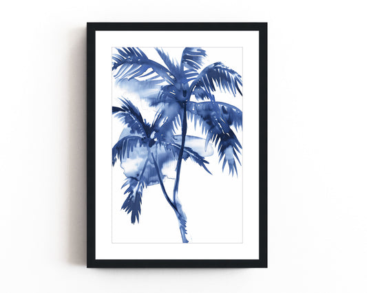 Blue watercolor palm tree print in a black frame, featuring vibrant tropical palms with a calming coastal feel.