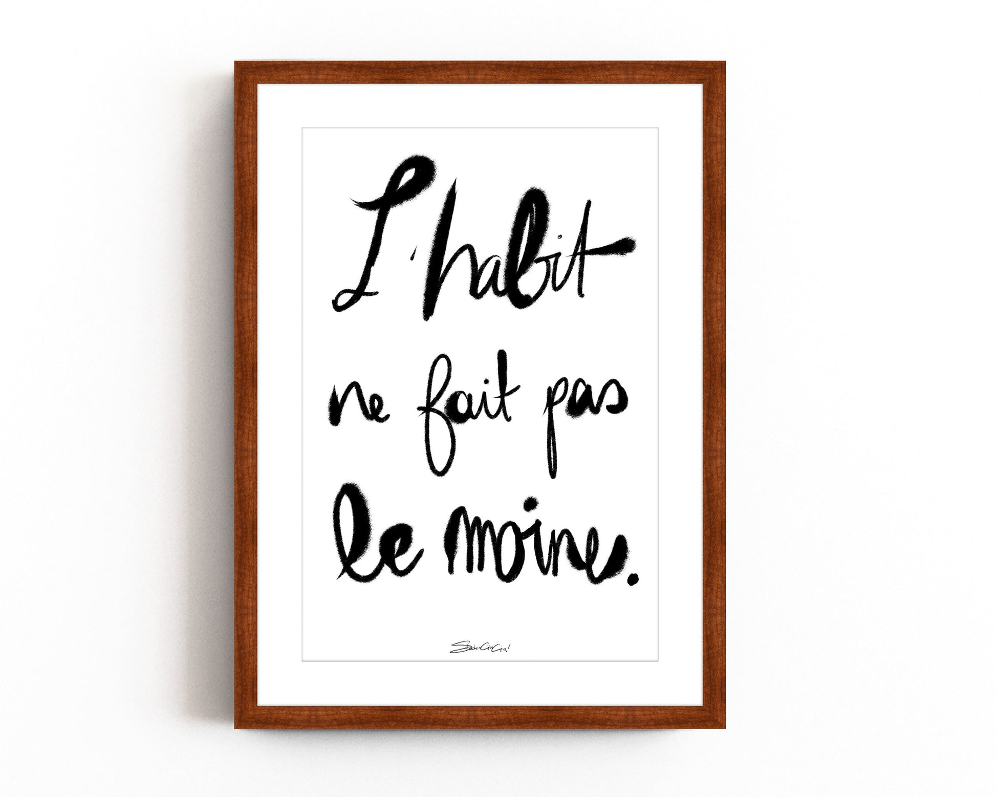 French typography print with “L’habit ne fait pas le moine” phrase in modern calligraphy style, black and white minimalist wall art.