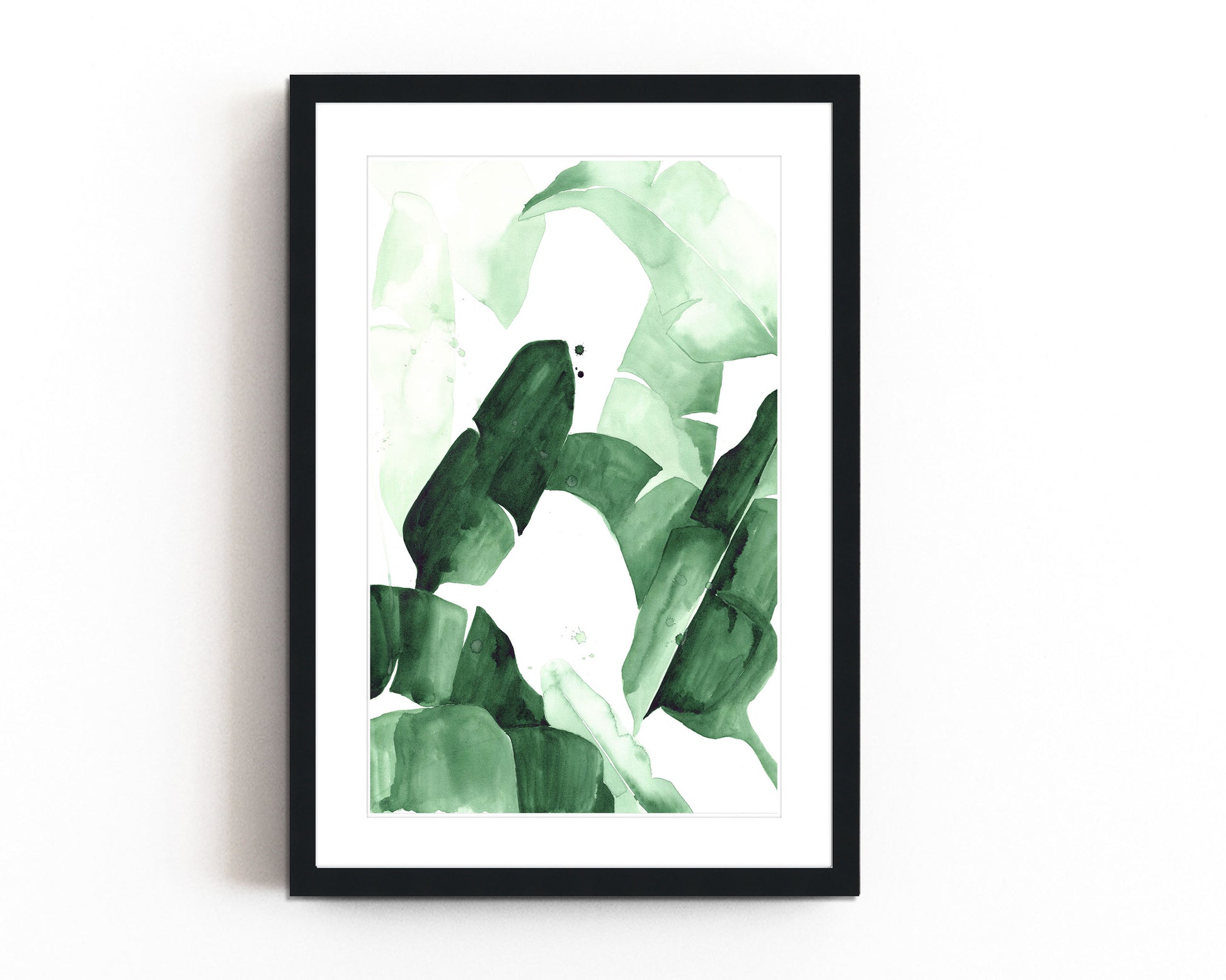 Abstract watercolor painting of tropical banana leaves in varying shades of green, featuring bold brushstrokes and layered textures, framed in blac