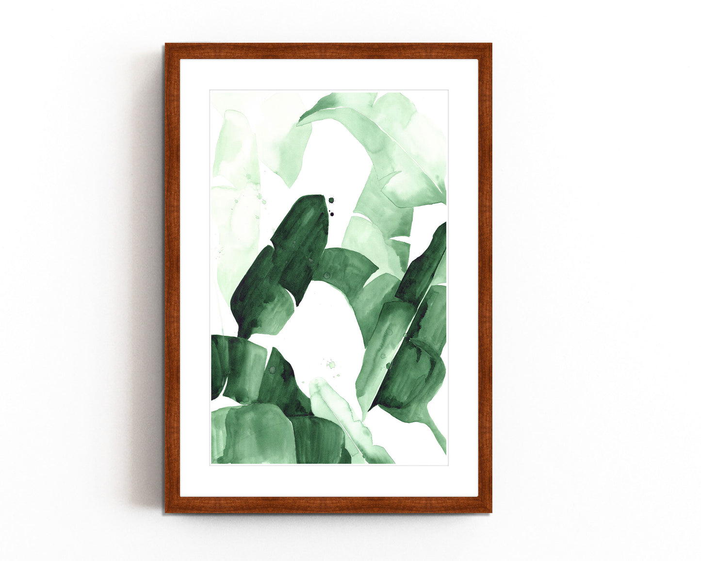 Abstract watercolor painting of tropical banana leaves in varying shades of green, featuring bold brushstrokes and layered textures, framed in blac