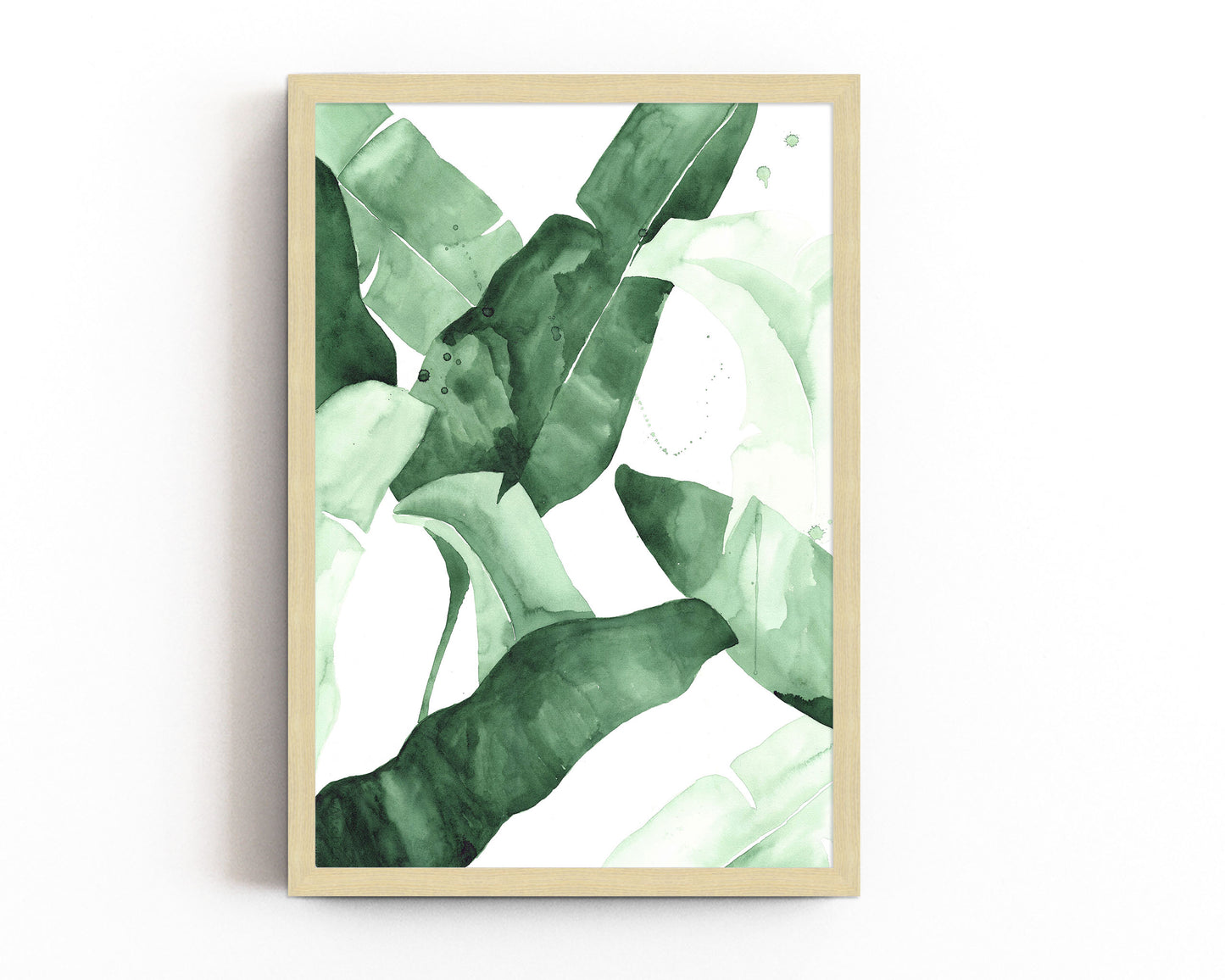 Abstract watercolor artwork featuring banana leaves in various shades of green, creating a tropical and nature-inspired aesthetic.