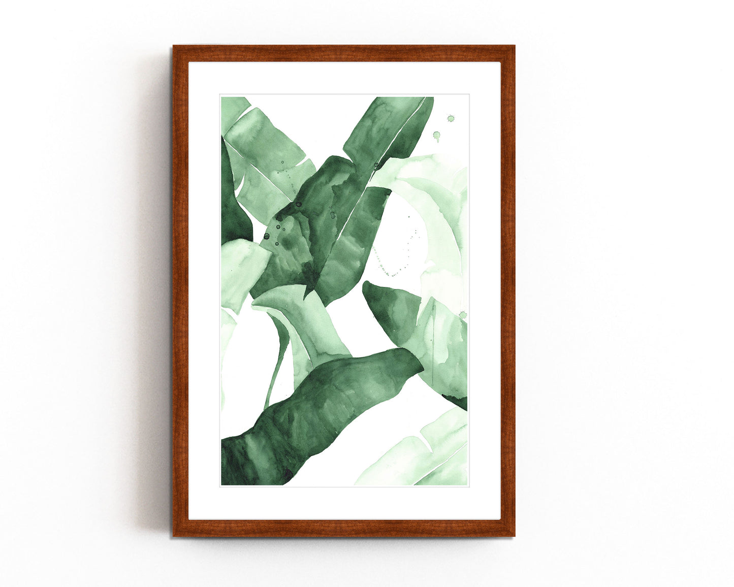 Abstract watercolor artwork featuring banana leaves in various shades of green, creating a tropical and nature-inspired aesthetic.