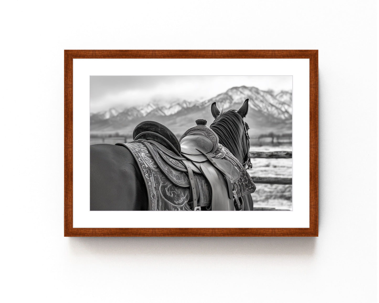 Black and white horse photography print featuring a horse with a detailed western saddle, set against a mountain landscape. Ideal for rustic equestrian decor and western-inspired art.