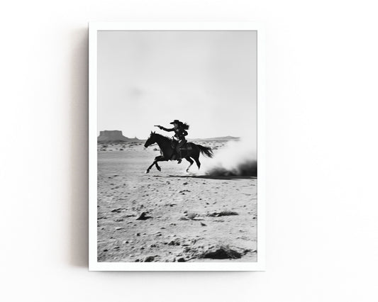 Black-and-white art print of a galloping cowboy in the desert, perfect for rustic western or minimalist home decor.