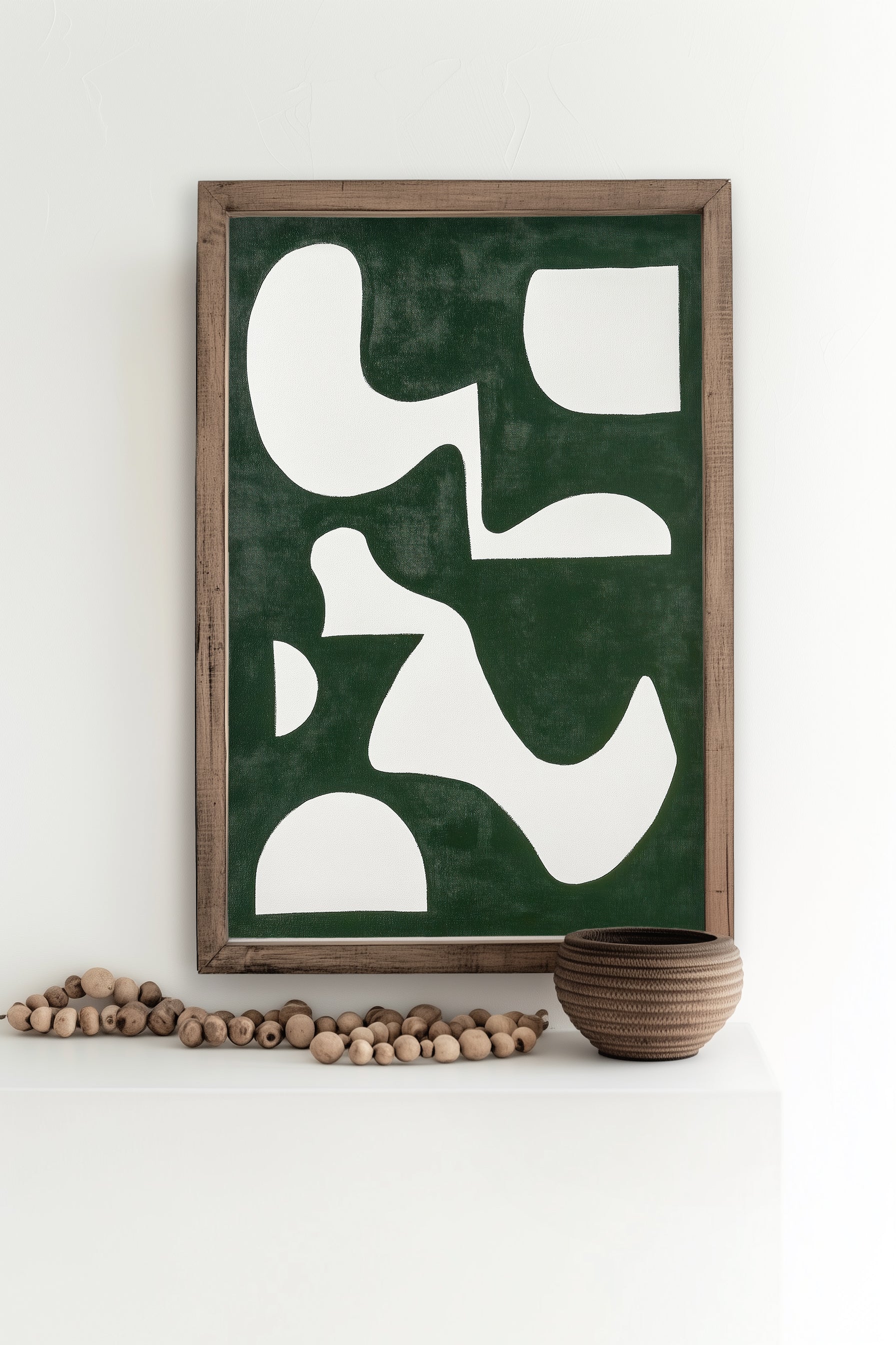 An abstract art print featuring bold white geometric shapes on a rich green background, perfect for modern and minimalist decor.