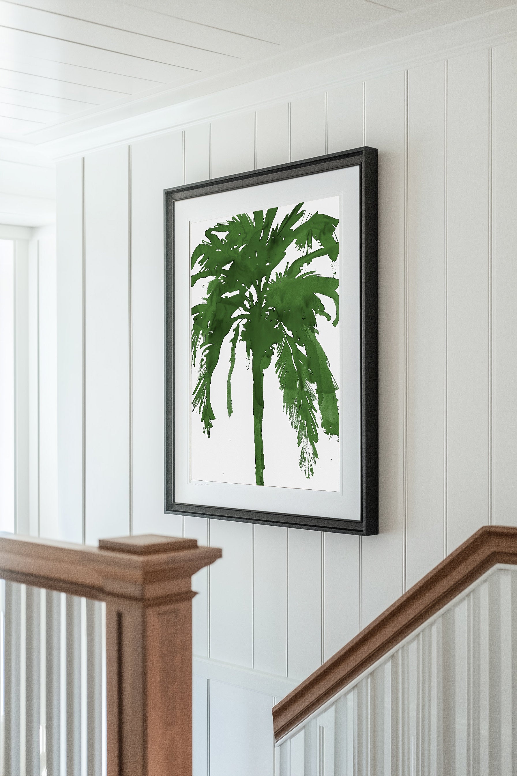 Bold green palm tree silhouette art print in a minimalist style on a white background. Perfect for tropical, coastal, or nature-inspired decor, this abstract botanical print adds a vibrant and modern touch to any space.