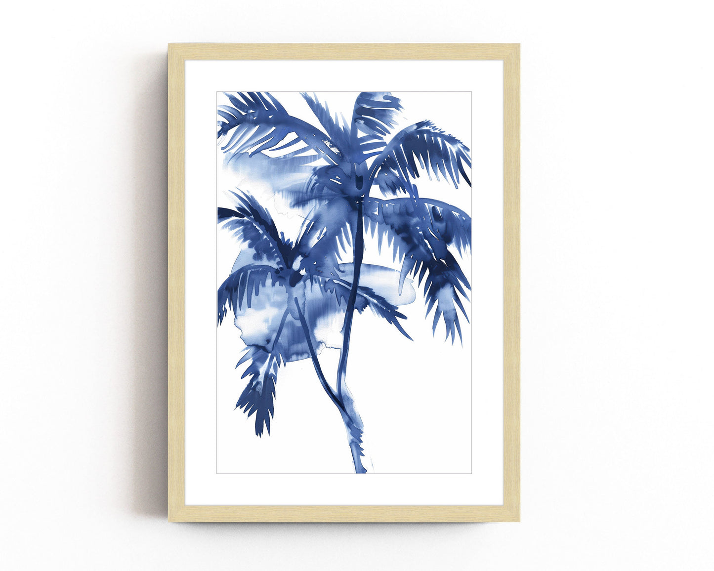 Blue watercolor palm tree print in a black frame, featuring vibrant tropical palms with a calming coastal feel.