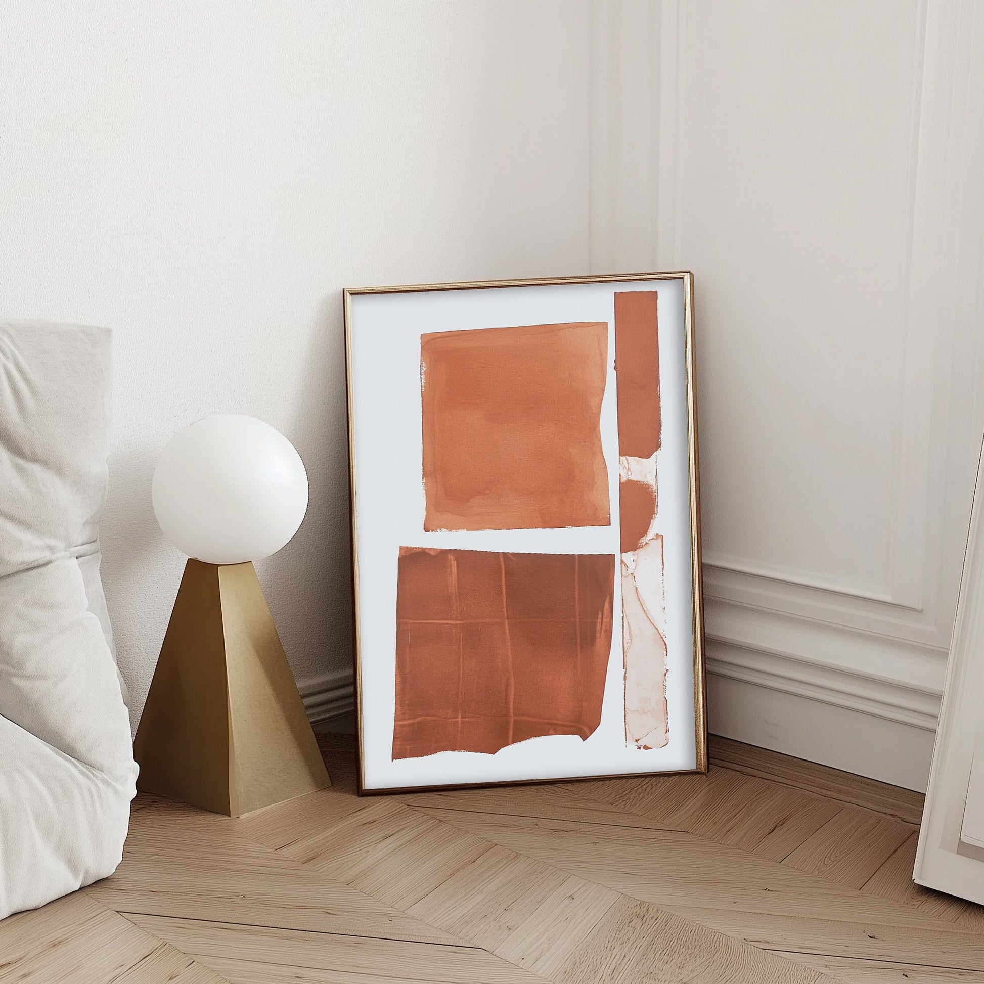 Abstract terracotta artwork featuring bold, organic shapes in earthy tones, perfect for minimalist or Southwest-inspired interiors.