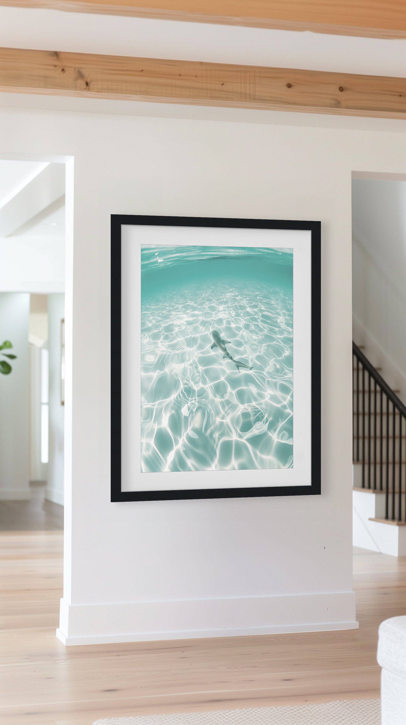 Underwater ocean photography print of a shark swimming through clear tropical waters with sunlight reflections, capturing marine life tranquility.