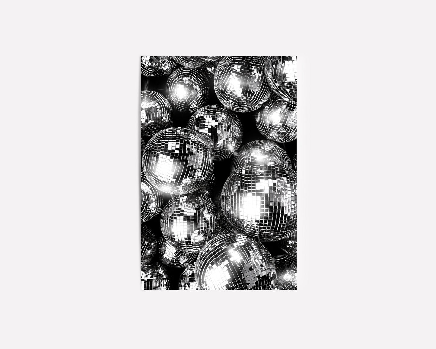  Black and silver disco ball wall art featuring reflective spheres with intricate details, creating a bold and glamorous modern decor statement.