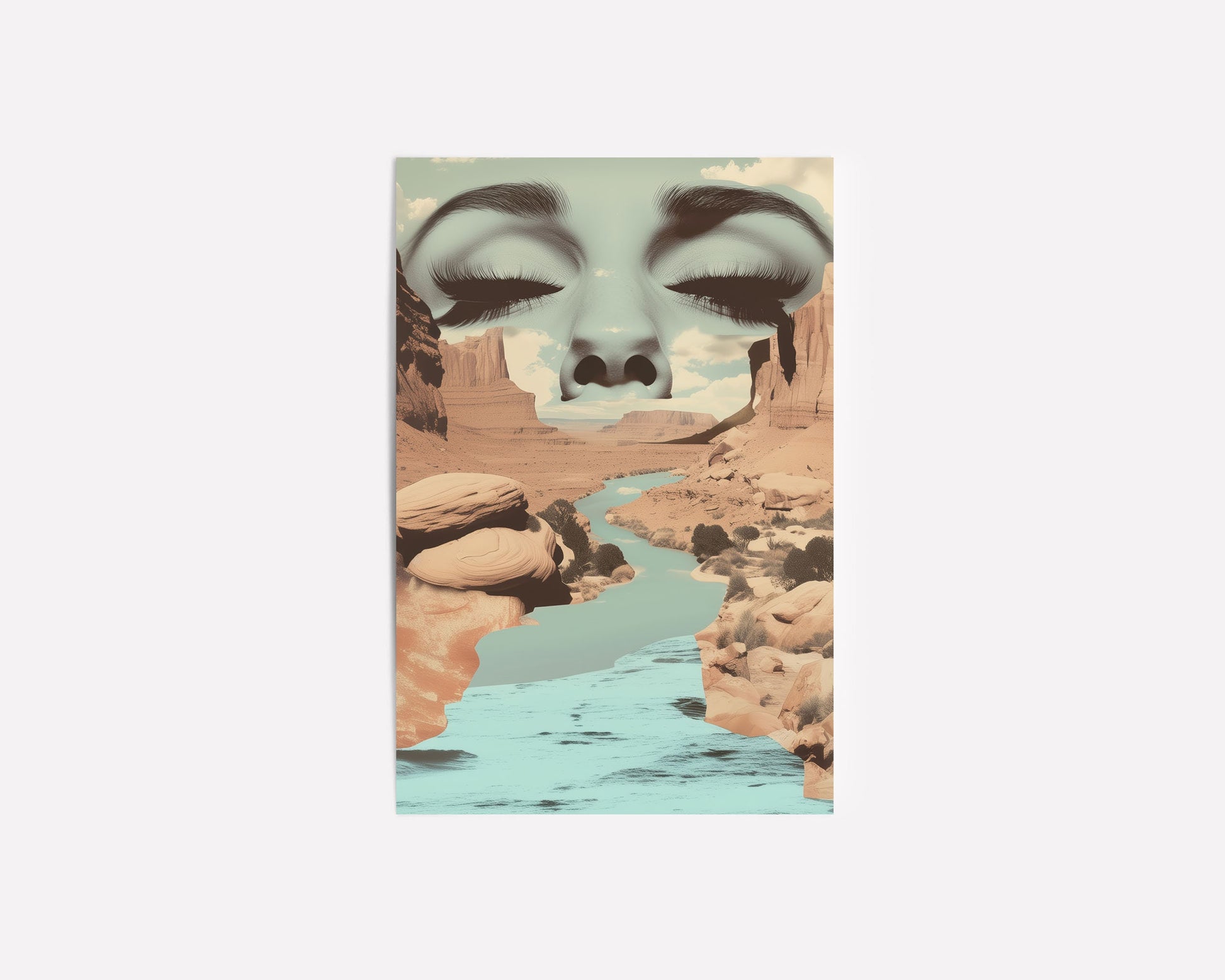 Surreal art print featuring a serene face merging with a desert canyon landscape and flowing river, blending nature and human elements in a dreamlike composition.