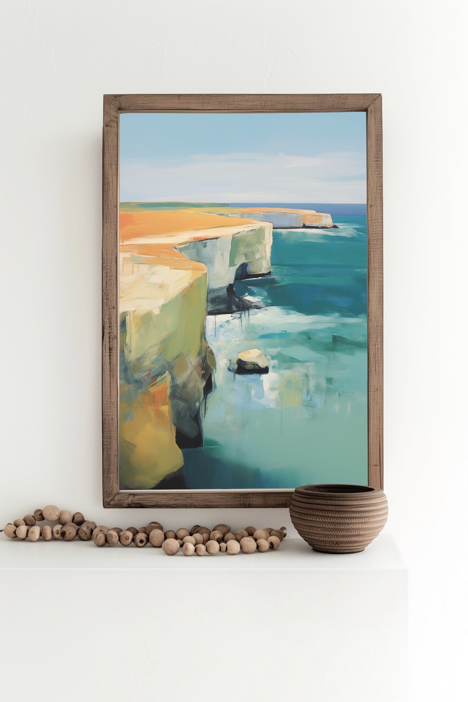 Abstract coastal cliff landscape art print with vibrant ocean blues and rugged seaside cliffs, perfect for contemporary coastal decor and beach house walls.