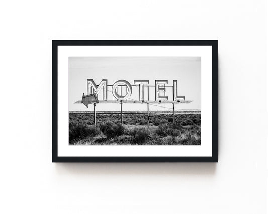 Vintage motel sign art print in black and white featuring a nostalgic roadside sign. Perfect for retro roadside decor, western-inspired art, and vintage wall photography