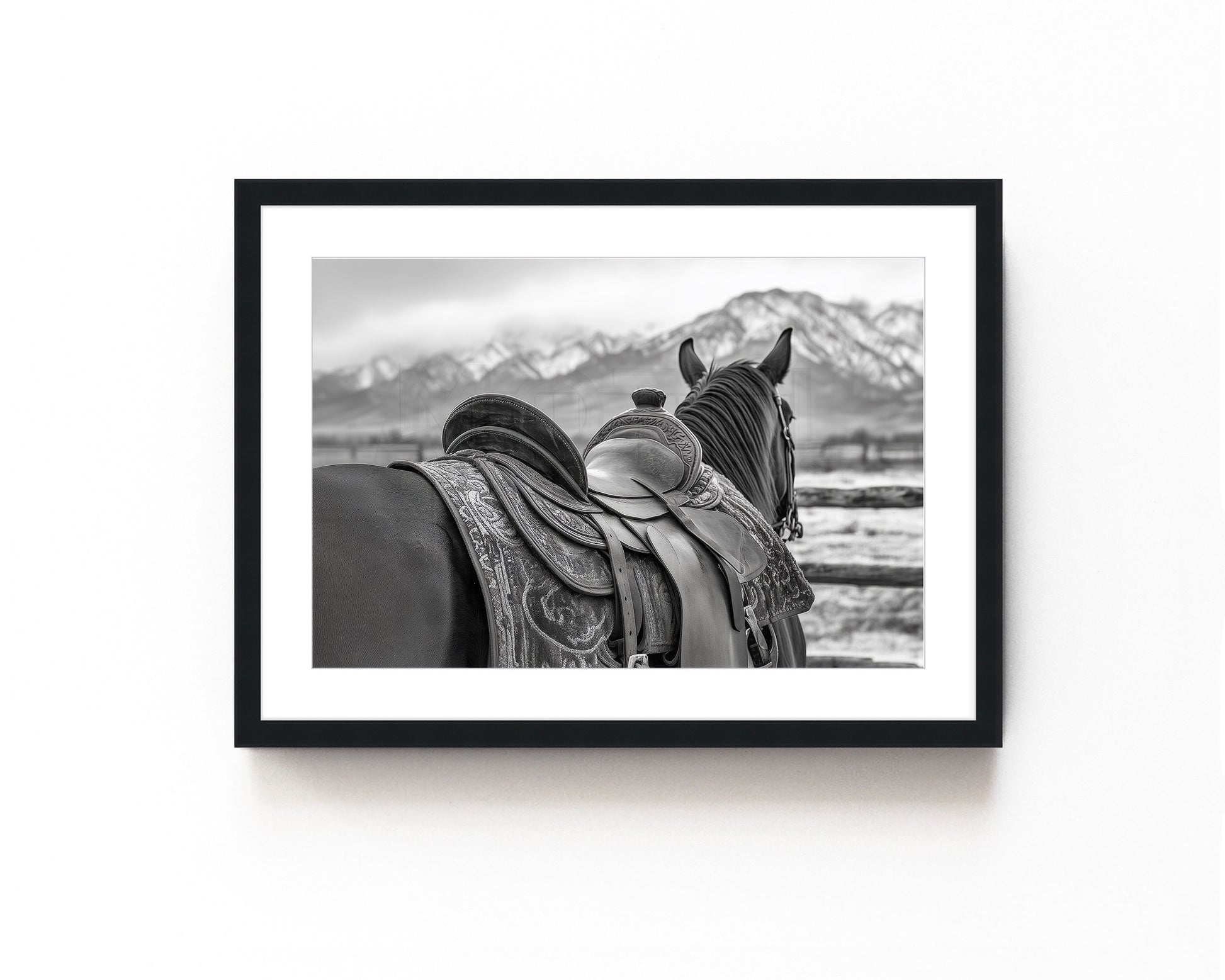 Black and white horse photography print featuring a horse with a detailed western saddle, set against a mountain landscape. Ideal for rustic equestrian decor and western-inspired art.