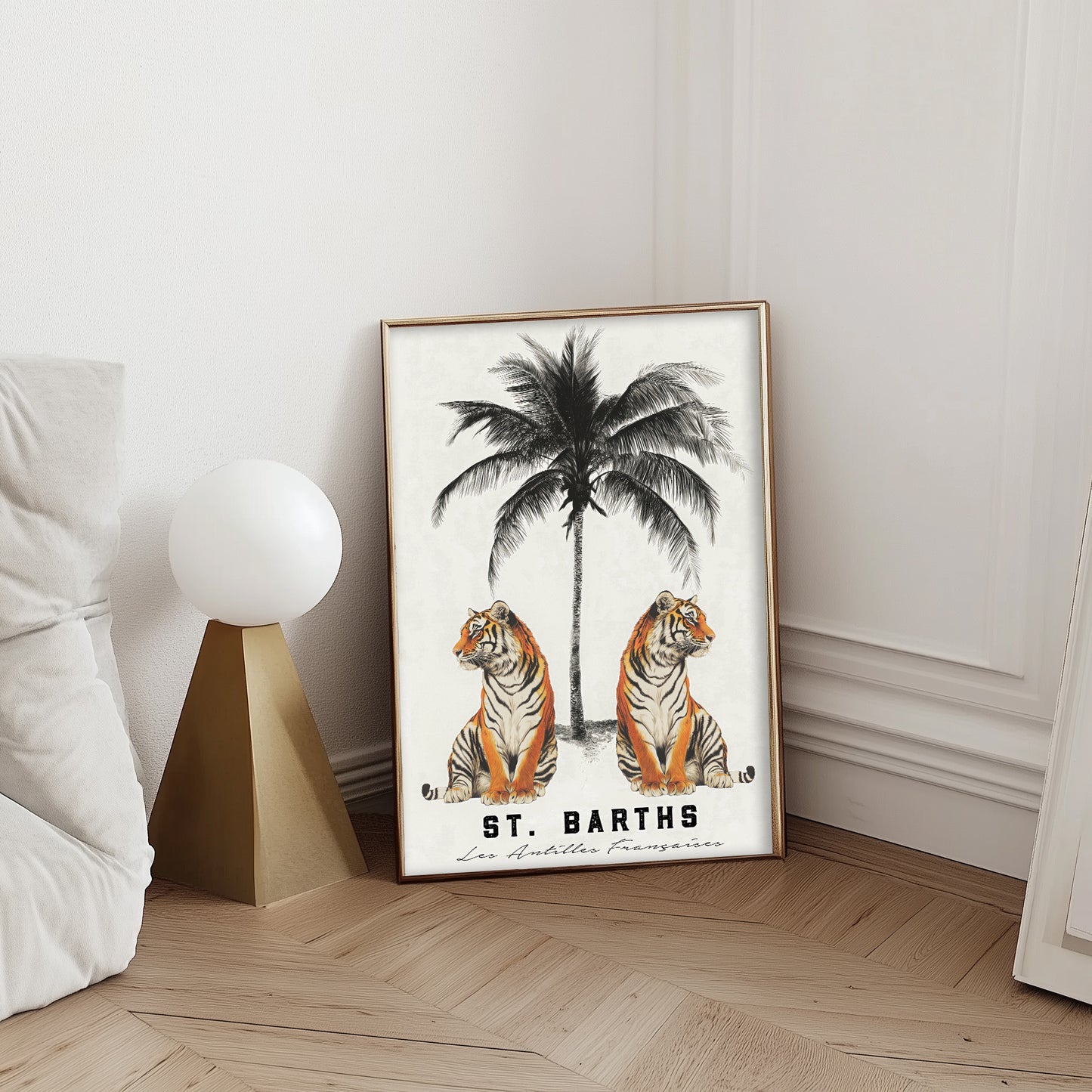 A vintage-style art print of two tigers under a palm tree with “St. Barths” and “Les Antilles Françaises” typography, ideal for tropical or travel-inspired decor.