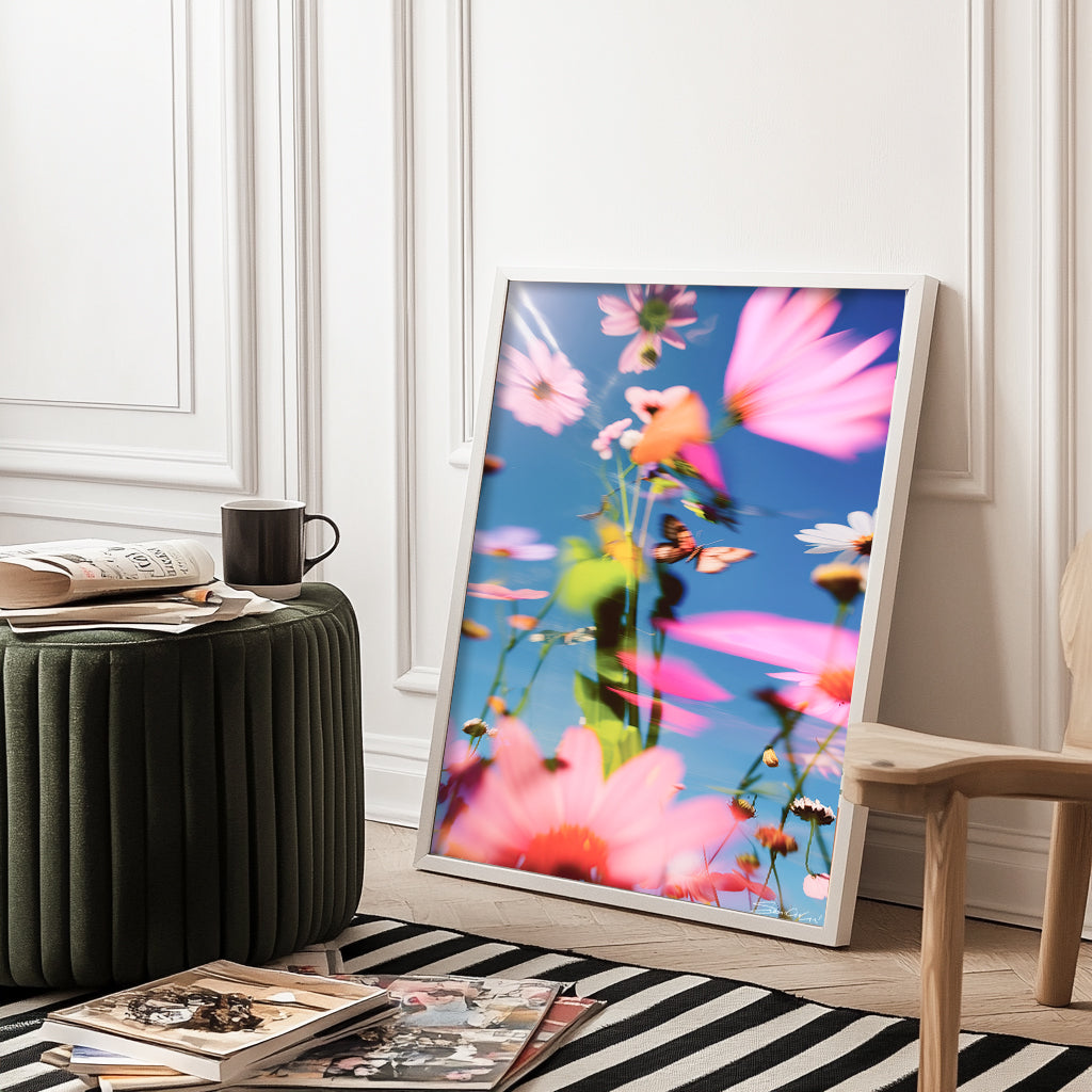 A vibrant and surreal floral print with blurred petals, capturing a dreamlike garden with prismatic colors in motion, titled Prismatica.